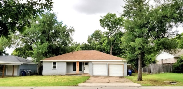 412 Ellis St, Allen, TX 75002 - ranch-style home with a garage, concrete driveway, and brick siding