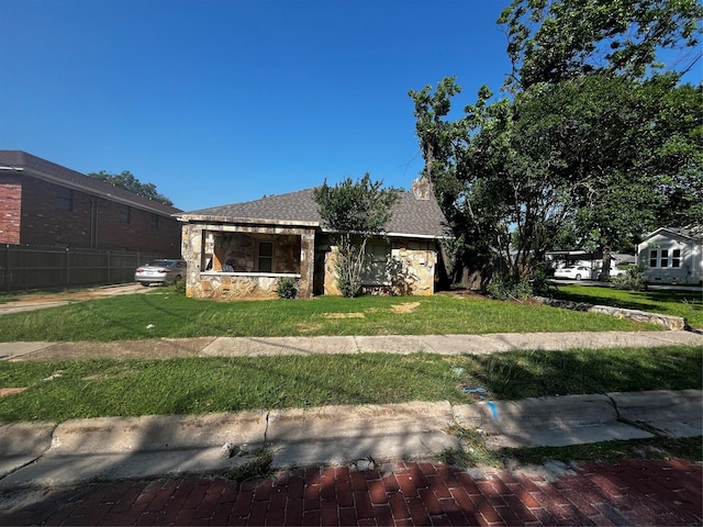 544 N Clinton St, Stephenville, TX 76401 - view of front of home featuring stone siding and roof with shingles