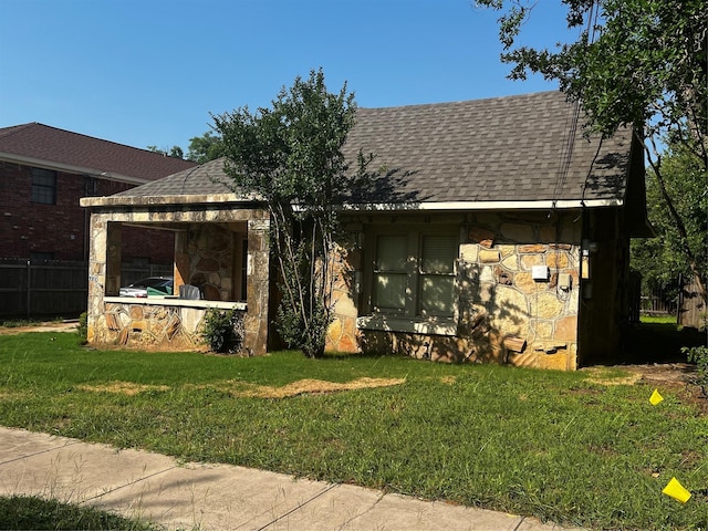 544 N Clinton St, Stephenville, TX 76401 - view of front of home featuring roof with shingles and stone siding