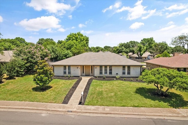 310 Naples Dr, Duncanville, TX 75116 - ranch-style home with a front lawn and brick siding