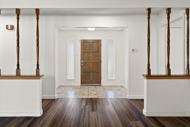 310 Naples Dr, Duncanville, TX 75116 - foyer with baseboards and wood finished floors