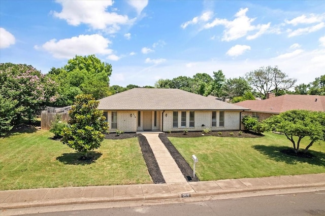 310 Naples Dr, Duncanville, TX 75116 - ranch-style home with a front lawn, driveway, and brick siding