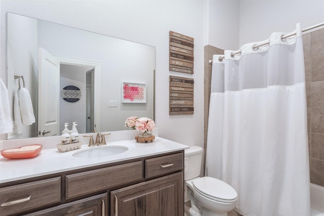704 Granite Shoals Dr, Mckinney, TX 75071 - full bath featuring vanity, toilet, and shower / tub combo with curtain
