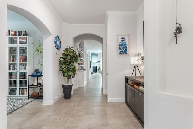 704 Granite Shoals Dr, Mckinney, TX 75071 - corridor with ornamental molding, baseboards, and arched walkways