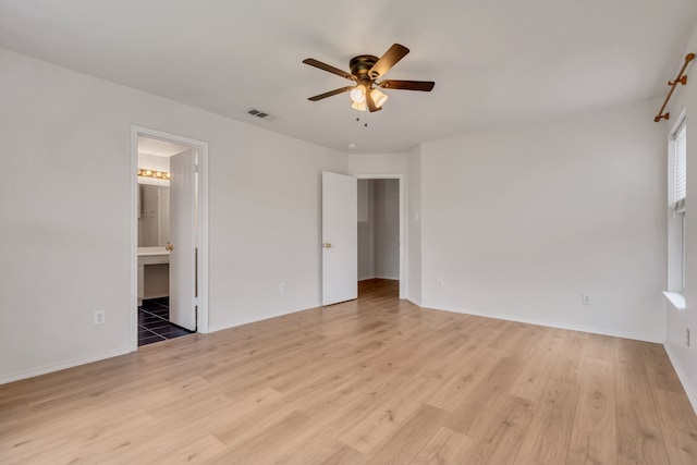 812 Piedmont Dr, Mckinney, TX 75071 - unfurnished bedroom with light wood-style floors, baseboards, connected bathroom, and ceiling fan