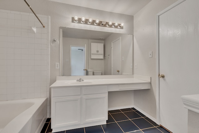 812 Piedmont Dr, Mckinney, TX 75071 - full bathroom with toilet, tile patterned floors, bathtub / shower combination, vanity, and baseboards