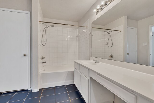 812 Piedmont Dr, Mckinney, TX 75071 - bathroom with tub / shower combination, vanity, and tile patterned flooring