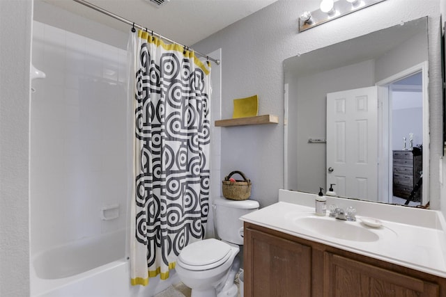 115 Roundup Rd, Waxahachie, TX 75165 - full bath with vanity, toilet, shower / bath combo, and a textured wall