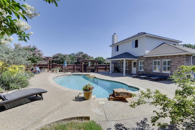 115 Roundup Rd, Waxahachie, TX 75165 - view of swimming pool with a pergola, a fenced backyard, and a patio