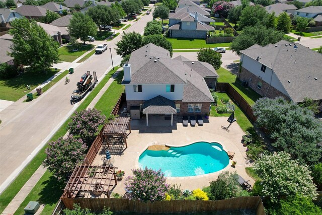 115 Roundup Rd, Waxahachie, TX 75165 - aerial perspective of suburban area featuring a pool