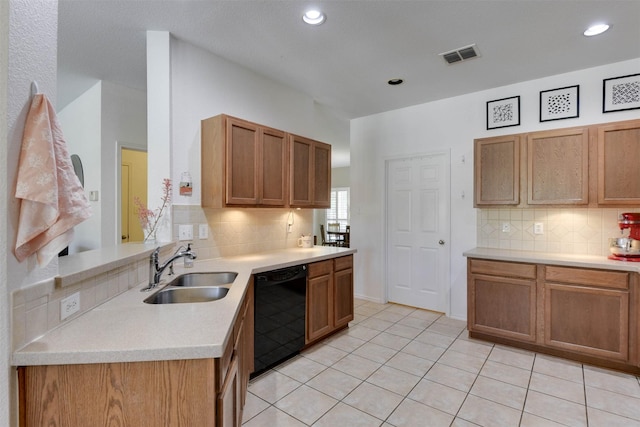115 Roundup Rd, Waxahachie, TX 75165 - kitchen featuring dishwasher, a sink, light countertops, decorative backsplash, and recessed lighting