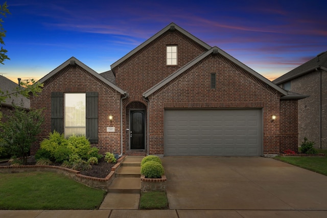 1809 13th St, Argyle, TX 76226 - traditional-style home with brick siding, driveway, and an attached garage