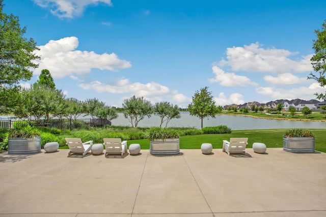 1809 13th St, Argyle, TX 76226 - view of patio with a water view and a residential view