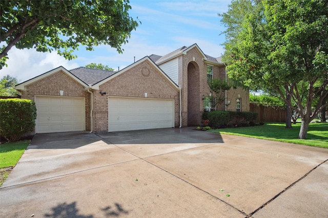 841 Brittany Way, Prosper, TX 75078 - traditional-style home with concrete driveway, brick siding, and an attached garage