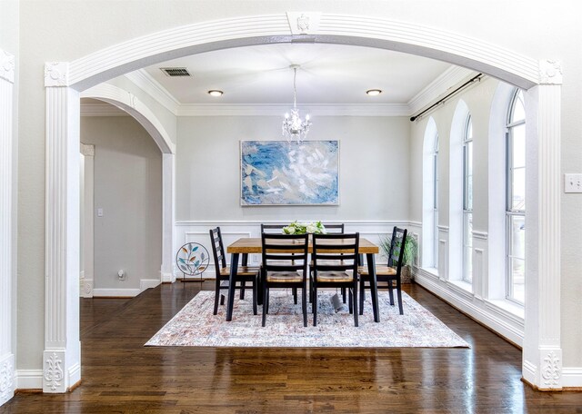 124 Lonesome Trl, Haslet, TX 76052 - dining room with arched walkways, healthy amount of natural light, dark wood-style floors, a chandelier, and ornamental molding