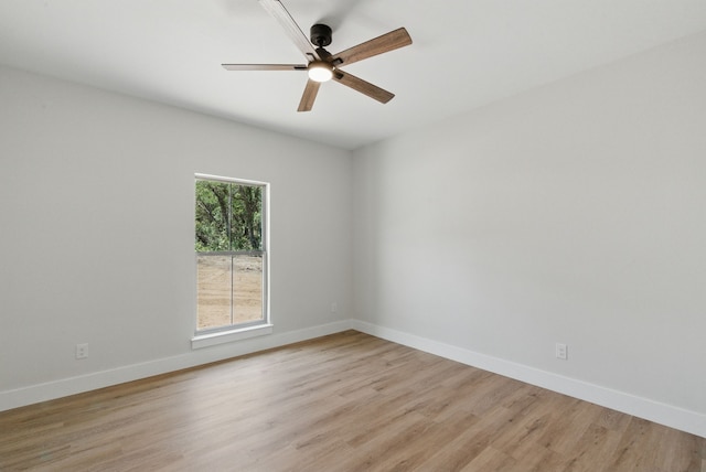550 Blue Marlin Ct, Bluff Dale, TX 76433 - unfurnished room with light wood-style floors, a ceiling fan, and baseboards