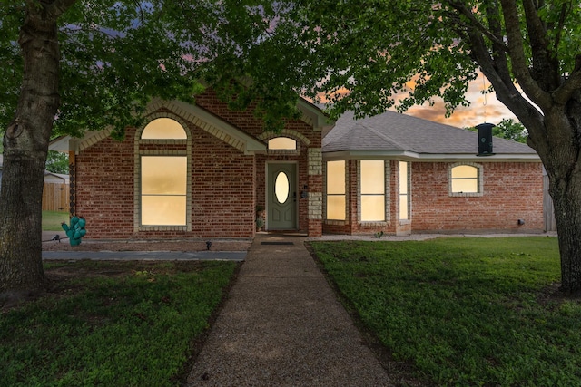 475 Maywood, Woodway, TX 76712 - ranch-style home featuring brick siding, a lawn, and a shingled roof