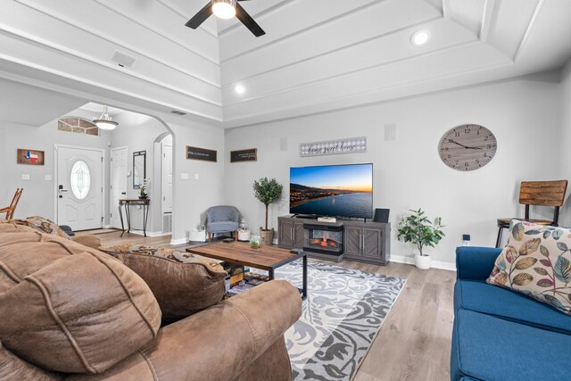475 Maywood, Woodway, TX 76712 - living area with arched walkways, a ceiling fan, wood finished floors, and baseboards