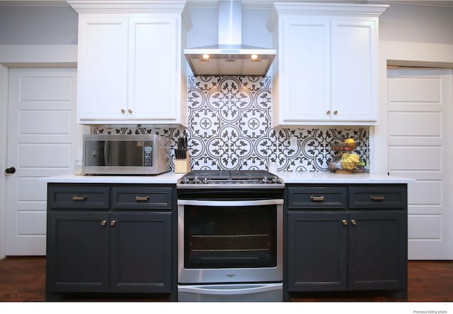 1951 College Ave, Fort Worth, TX 76110 - kitchen with appliances with stainless steel finishes, island exhaust hood, and white cabinetry