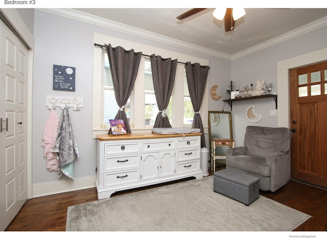 1951 College Ave, Fort Worth, TX 76110 - living area featuring dark wood finished floors, ceiling fan, ornamental molding, and baseboards
