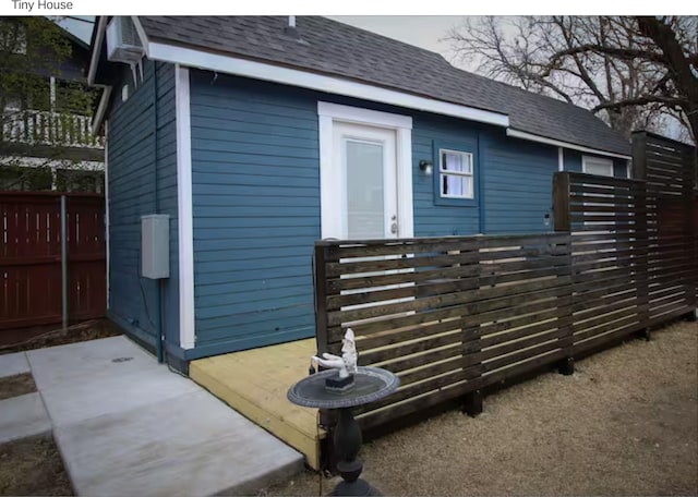 1951 College Ave, Fort Worth, TX 76110 - view of home's exterior with roof with shingles