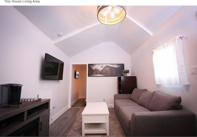 1951 College Ave, Fort Worth, TX 76110 - living room featuring dark wood finished floors, lofted ceiling, and baseboards