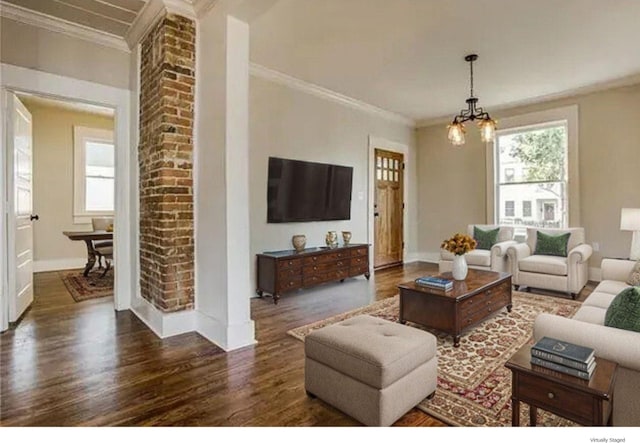 1951 College Ave, Fort Worth, TX 76110 - living area with wood finished floors, ornamental molding, a chandelier, and baseboards