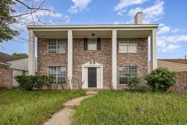 912 Brae Loch Dr, Dallas, TX 75217 - view of front of property with a chimney and brick siding