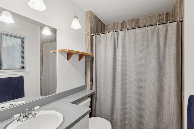 226 Hillcrest St, Sanger, TX 76266 - bathroom featuring vanity, toilet, and curtained shower