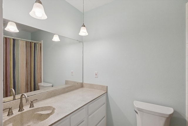 226 Hillcrest St, Sanger, TX 76266 - bathroom featuring toilet, vanity, and a shower with shower curtain