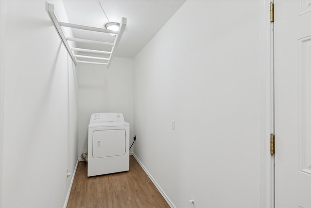 226 Hillcrest St, Sanger, TX 76266 - washroom featuring washer / dryer, wood finished floors, and baseboards