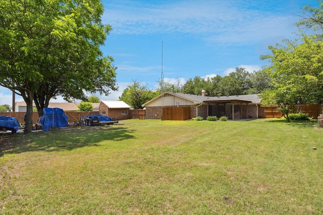 226 Hillcrest St, Sanger, TX 76266 - view of yard with a sunroom