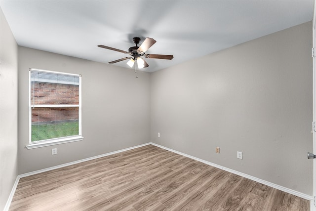 203 Mustang Trl, Celina, TX 75009 - unfurnished room with a ceiling fan, wood finished floors, and baseboards