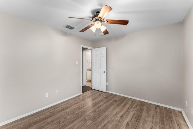 203 Mustang Trl, Celina, TX 75009 - unfurnished room with ceiling fan, wood finished floors, and baseboards