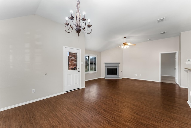 203 Mustang Trl, Celina, TX 75009 - unfurnished living room with vaulted ceiling, ceiling fan, a fireplace with raised hearth, and dark wood-style flooring