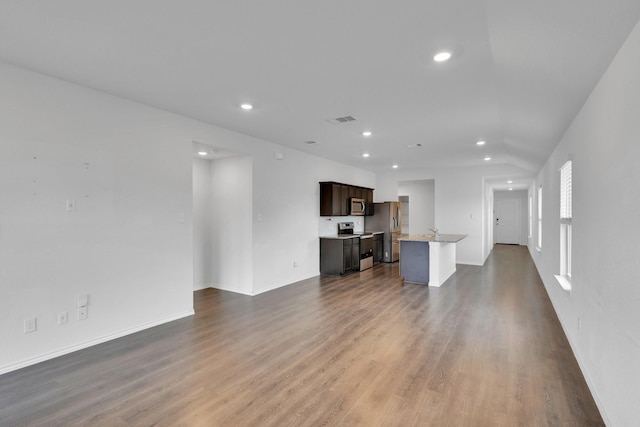 1408 Sebastian Dr, Forney, TX 75126 - unfurnished living room featuring recessed lighting and dark wood-style floors
