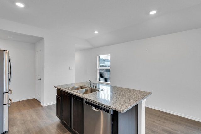 1408 Sebastian Dr, Forney, TX 75126 - kitchen with stainless steel appliances, a sink, wood finished floors, baseboards, and an island with sink