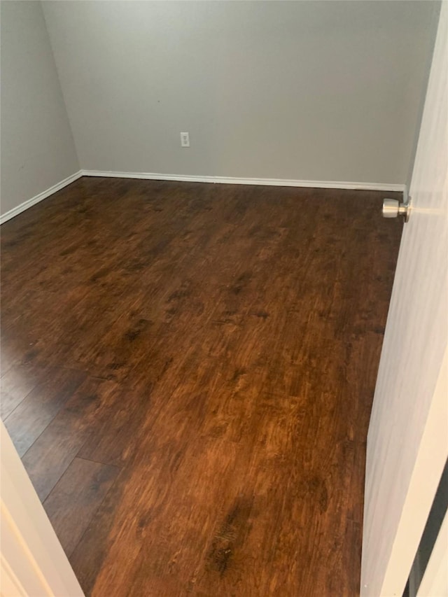 833 San Miguel Trl, Fort Worth, TX 76052 - unfurnished room with dark wood finished floors and baseboards
