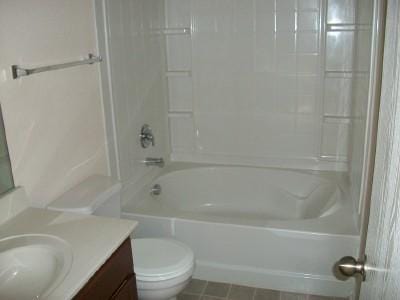 833 San Miguel Trl, Fort Worth, TX 76052 - bathroom with vanity, shower / tub combination, and toilet