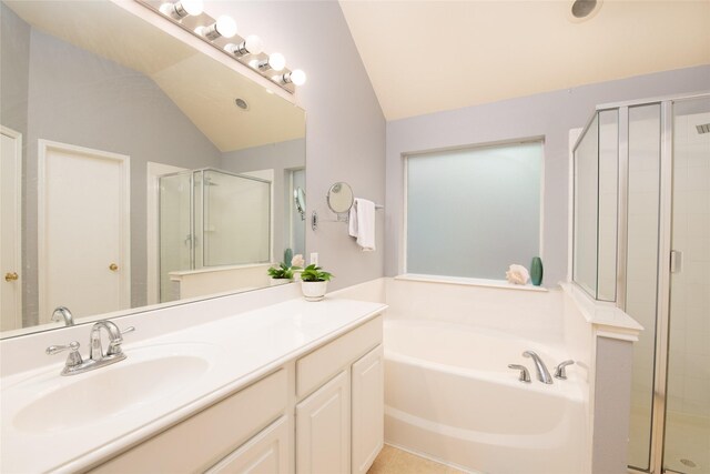4017 Summerhill Ln, Fort Worth, TX 76244 - bathroom with vaulted ceiling, a shower stall, a bath, and vanity
