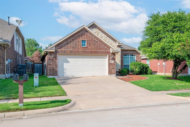 4017 Summerhill Ln, Fort Worth, TX 76244 - view of front of property with brick siding, concrete driveway, a front lawn, and a garage