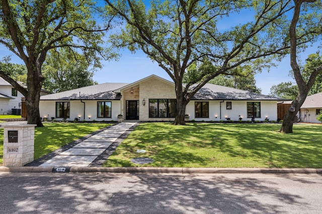 4162 Allencrest Ln, Dallas, TX 75244 - mid-century modern home with a front lawn and stone siding