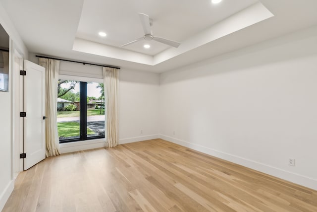 4162 Allencrest Ln, Dallas, TX 75244 - unfurnished room with a tray ceiling, light wood-style floors, baseboards, a ceiling fan, and recessed lighting