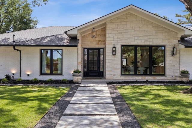 4162 Allencrest Ln, Dallas, TX 75244 - view of front of property featuring a front yard, stone siding, and a shingled roof