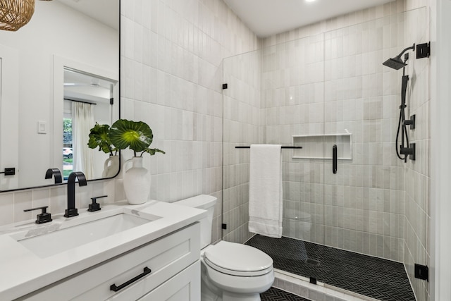 4162 Allencrest Ln, Dallas, TX 75244 - full bath with toilet, a shower stall, vanity, and tile walls