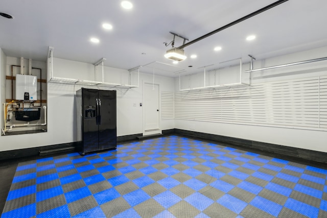 4162 Allencrest Ln, Dallas, TX 75244 - garage featuring black fridge, a garage door opener, recessed lighting, baseboards, and tankless water heater