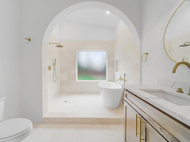 209 S Marlborough Ave, Dallas, TX 75208 - bathroom featuring toilet, vanity, a walk in shower, and a soaking tub