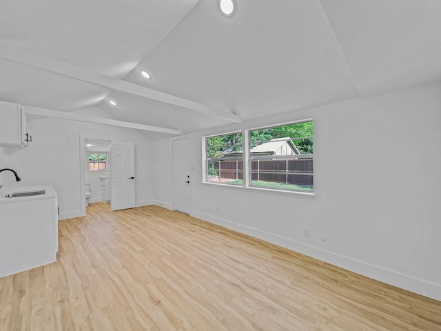 209 S Marlborough Ave, Dallas, TX 75208 - unfurnished living room with a sink, light wood-type flooring, baseboards, and recessed lighting