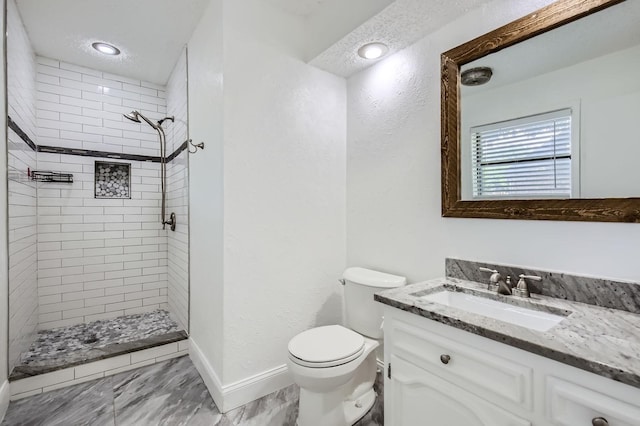 8 Canyon Ridge Dr, Fate, TX 75087 - full bath with a shower stall, vanity, toilet, baseboards, and a textured wall