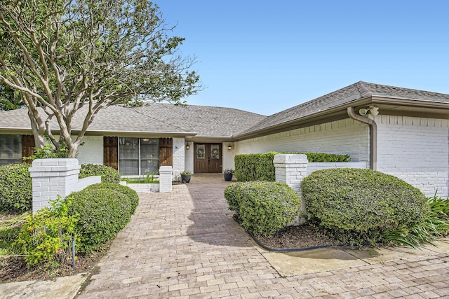 8 Canyon Ridge Dr, Fate, TX 75087 - ranch-style home featuring brick siding and roof with shingles